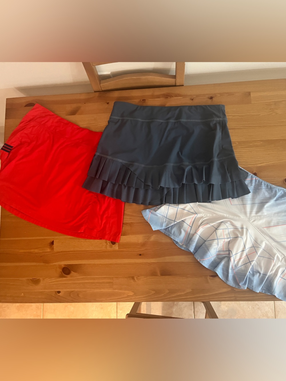 Set of 3 medium skorts for tennis/pickleball. FILA, sofibella, & lucky in love
